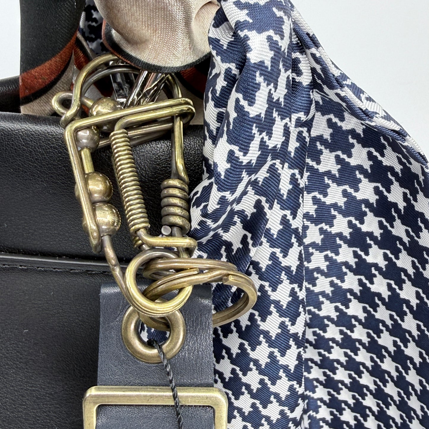 Navy Calfskin Necktie Bag Charm with Long Horn, Champagne Cold Buckle & Unique Clasp